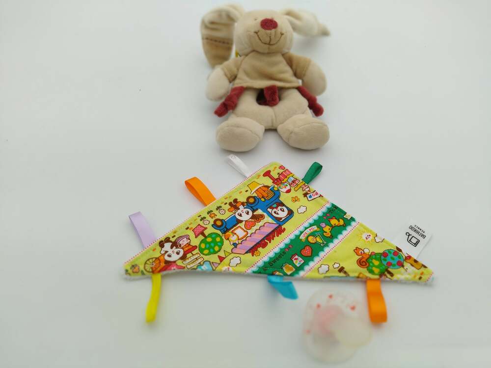 Doudou plat triangulaire