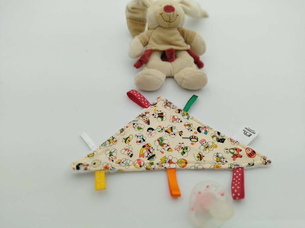 Doudou plat triangulaire