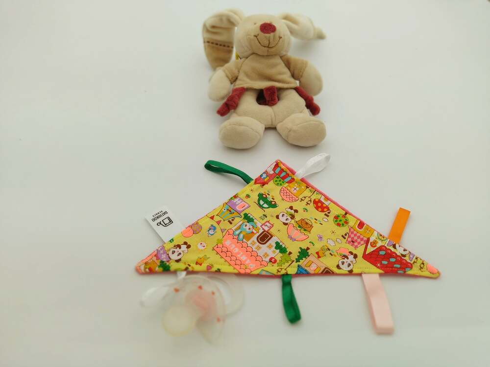 Doudou plat triangulaire